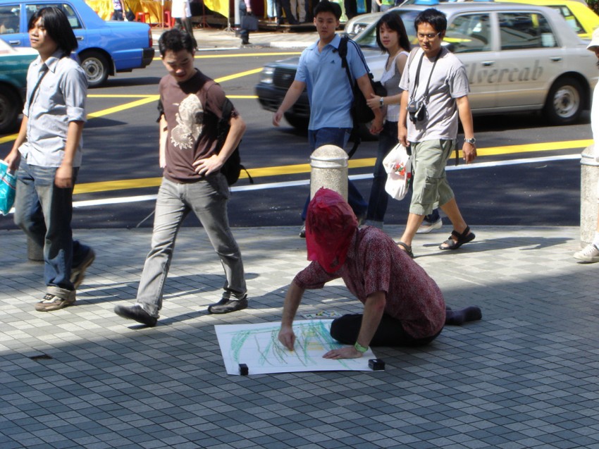 Man with a bag on his head by 